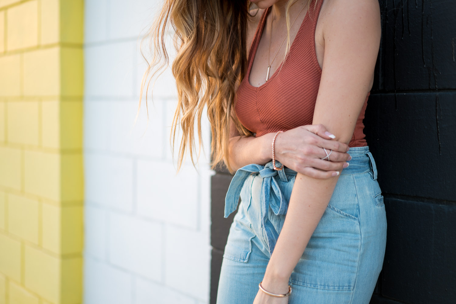 Urban Outfitters rust tank top, cropped jeans