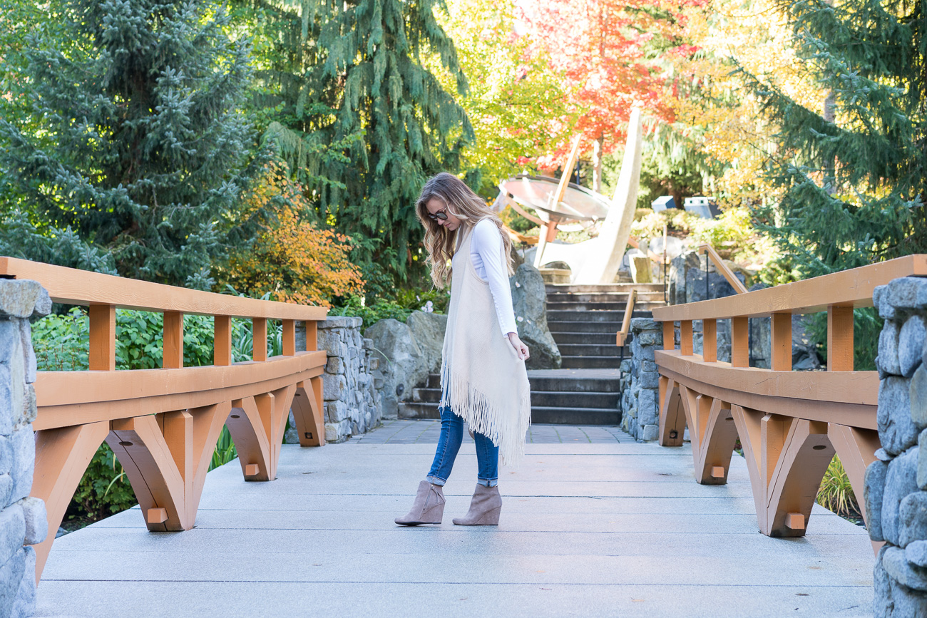 Nordstrom Fall outfit fringe sweater vest white thermal tee distressed ag skinny jeans dolce vita tan booties angela lanter hello gorgeous