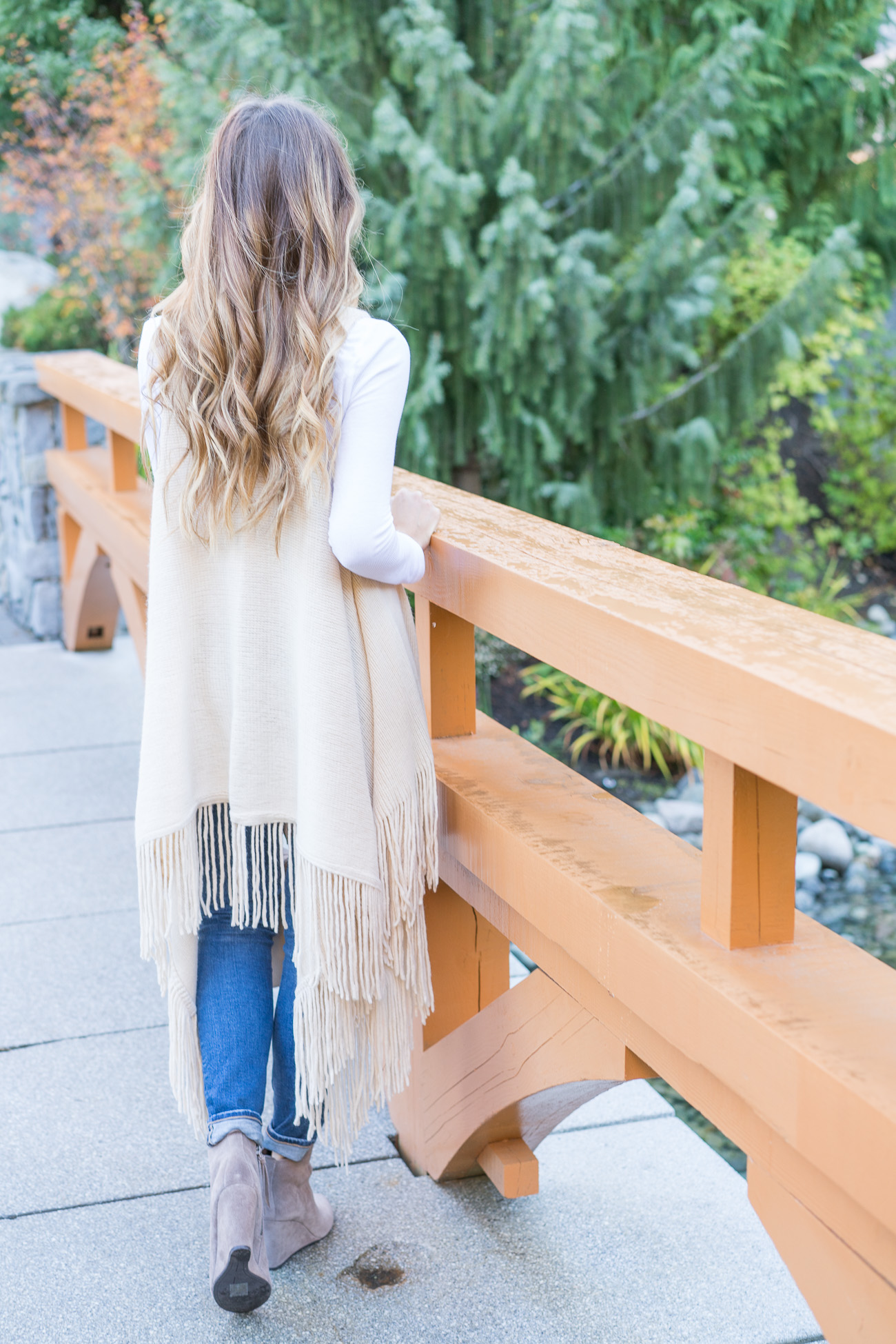 Nordstrom Fall outfit fringe sweater vest white thermal tee distressed ag skinny jeans dolce vita tan booties angela lanter hello gorgeous