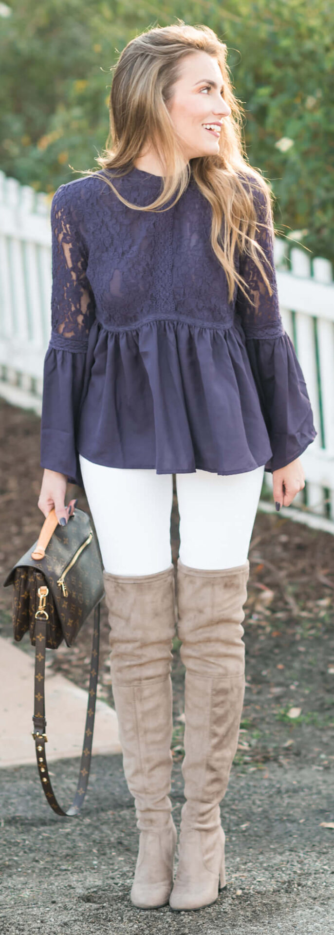 Winter Outfit I love: Blue Lace Peplum top, White Skinny Jeans, Steve Madden Over the knee boots, and Louis Vuitton Pochette Metis. Angela Lanter - Hello Gorgeous.