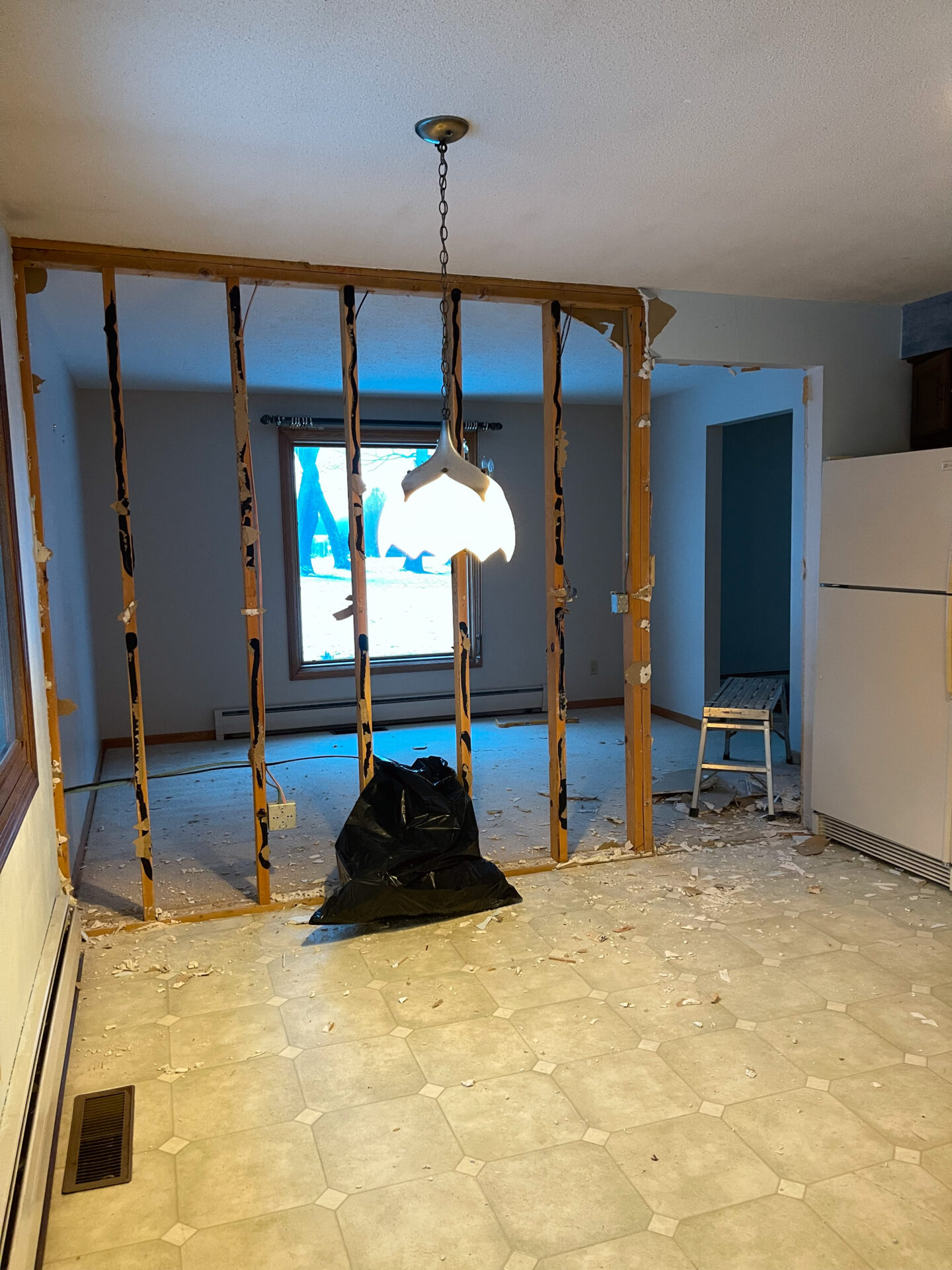 dining room before photos of Ohio renovation house project by home and style blogger Angela Lanter