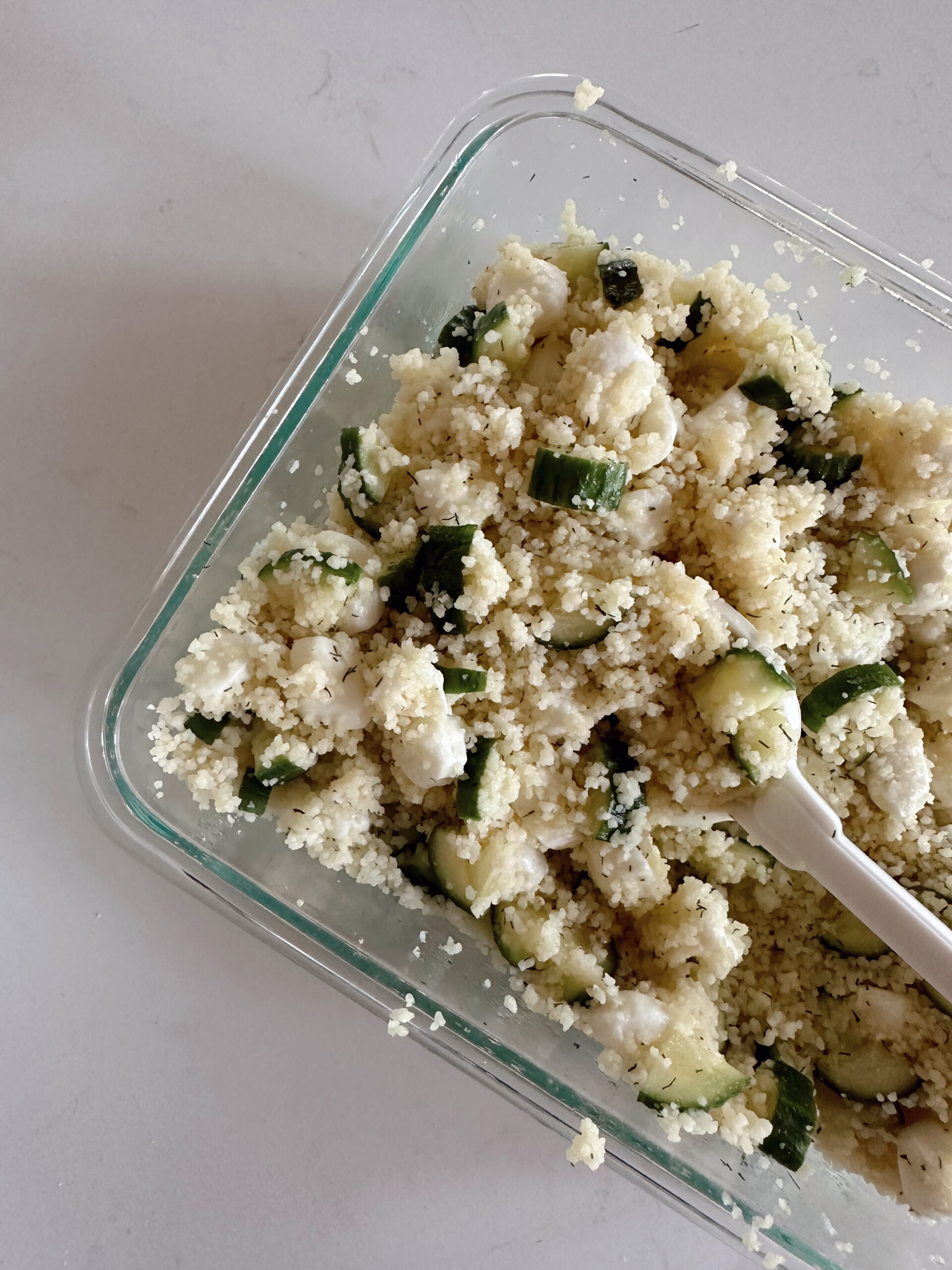 Cucumber Greek salad recipe for summer by lifestyle blogger Angela Lanter.